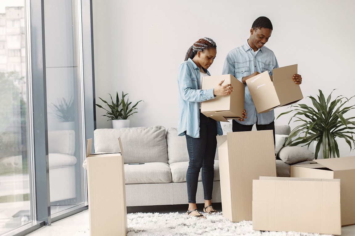 North Shore movers helping client pack and load truck